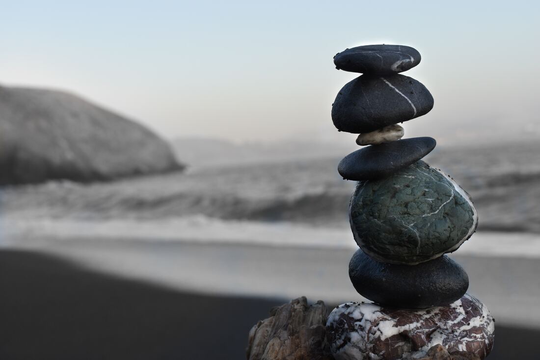 Stacked stones by the ocean